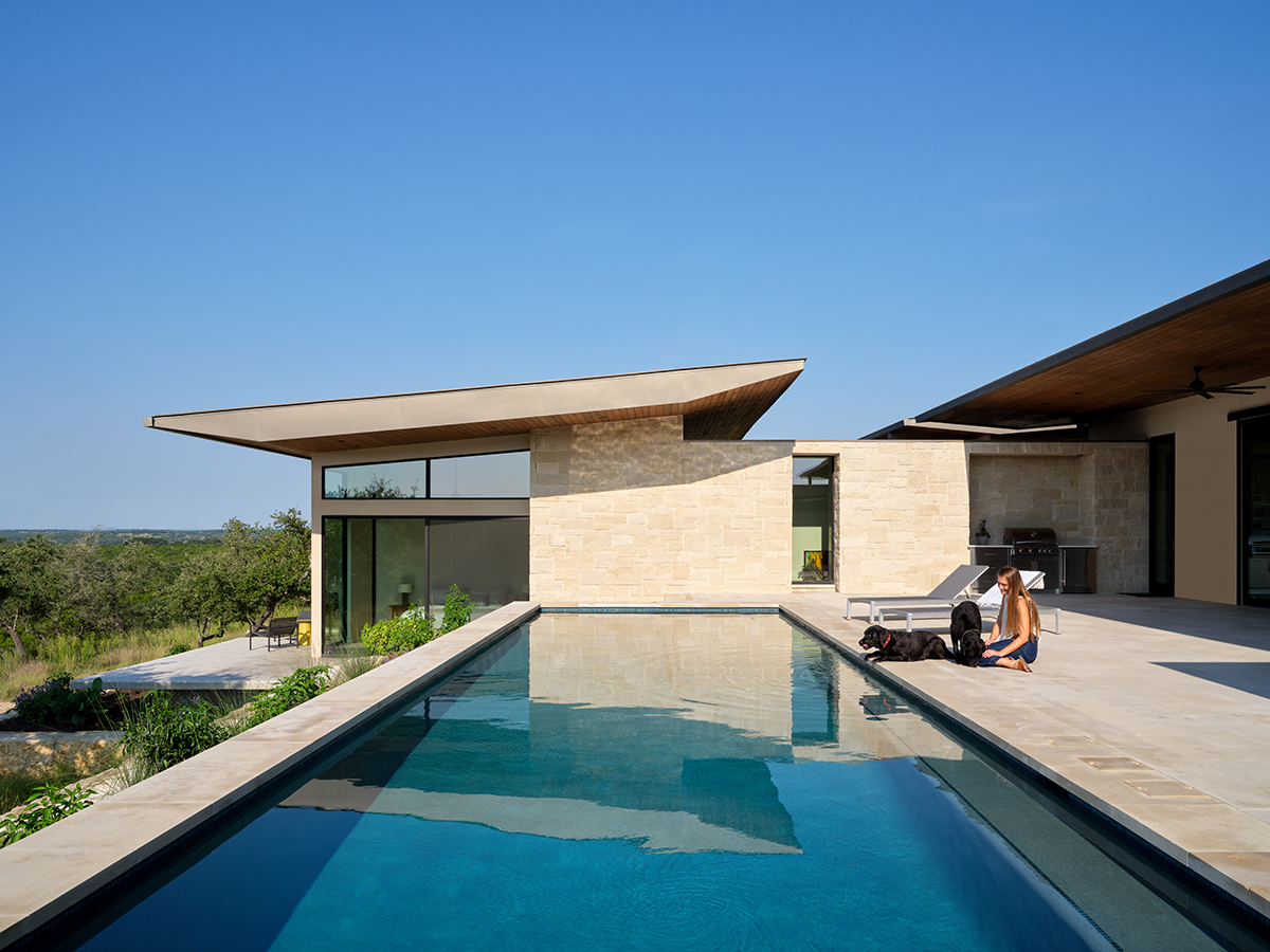 Pool on back on modern home