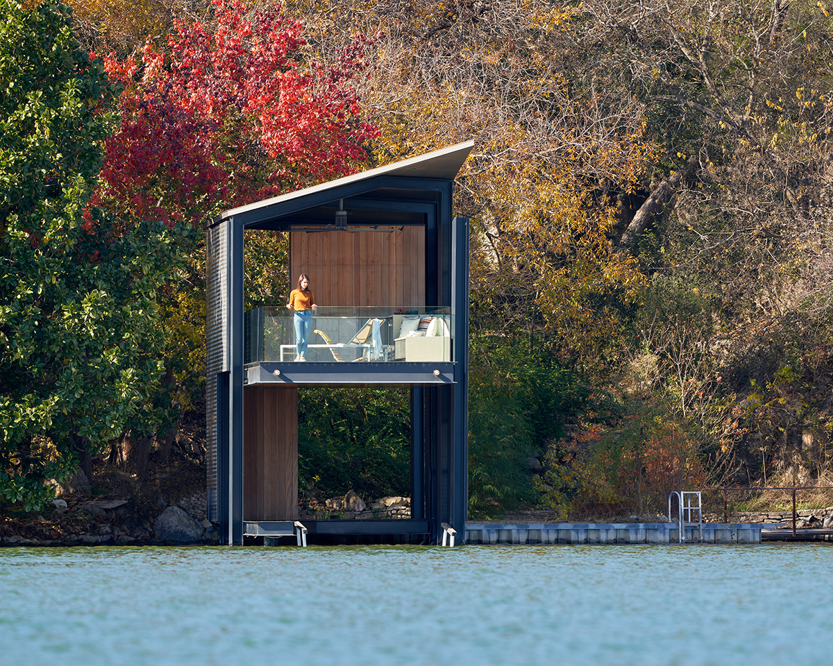 Two story dock on a lake with fall foliage