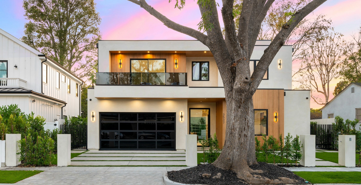 Rectangular modern home in urban area with wood and concrete facade